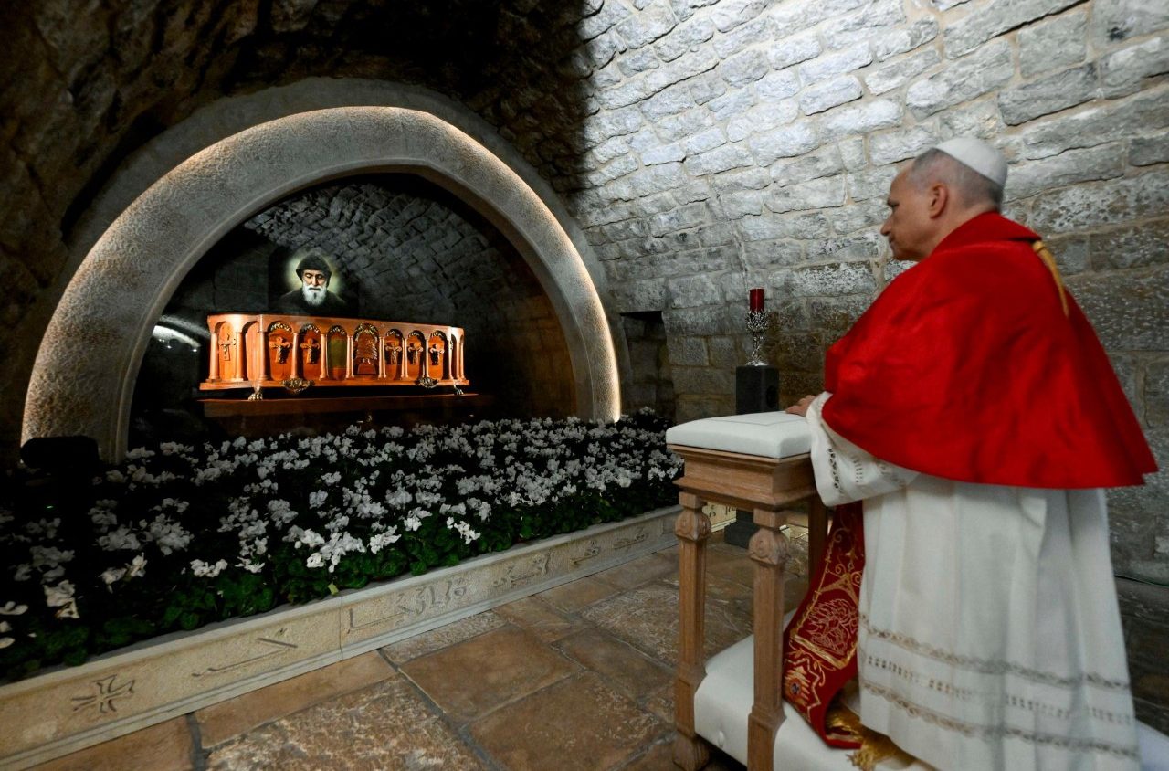 Pope Leo XIV praying at the tomb of Saint Sharbel